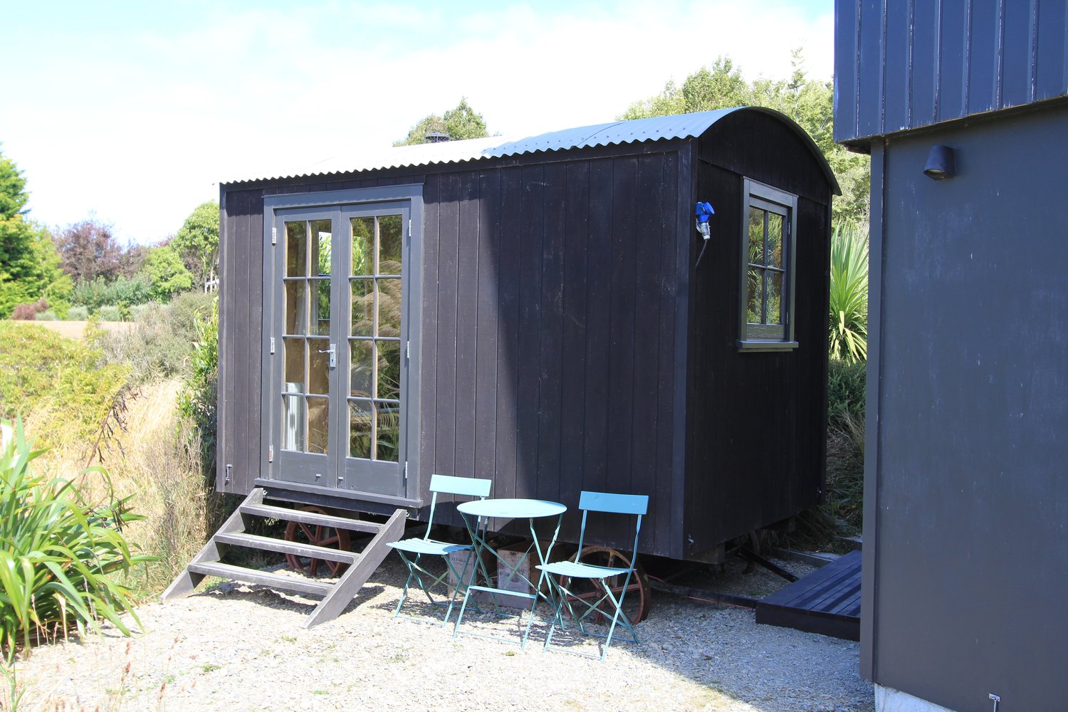 Bedroom view at The Bird Hide BnB Waikouaiti Dunedin - luxurious bedding with scenic outdoor views