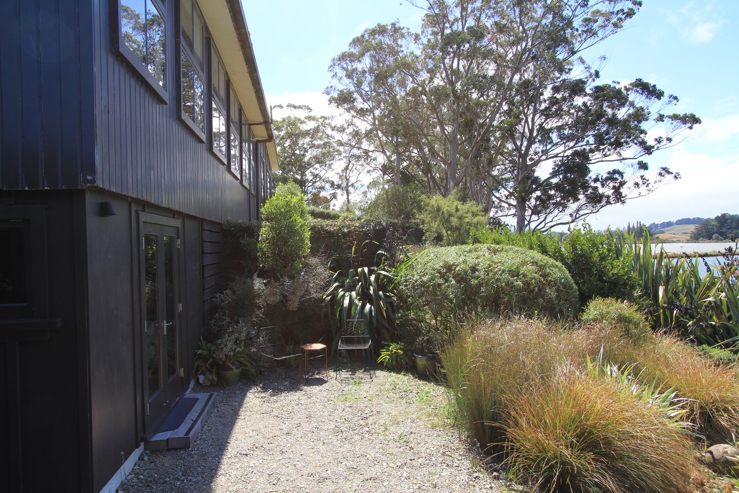 Garden view at The Bird Hide BnB Waikouaiti Dunedin - lush landscaping surrounding the accommodation